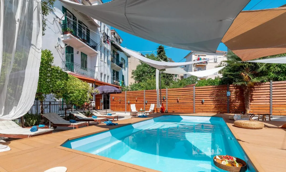 Image of Evala luxury rooms with pool and garden